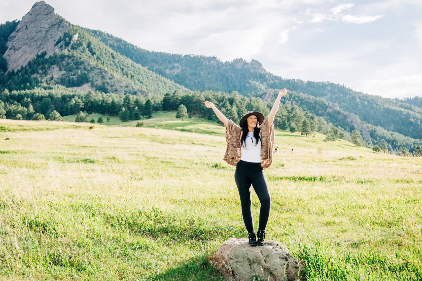 Liz Hunter, Boulder web designer, in a meadow below the Flatirons
